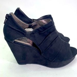 Carlos Santana Wedges